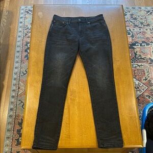 American Eagle, skinny fit stylish 32W 34L black faded jeans, great condition